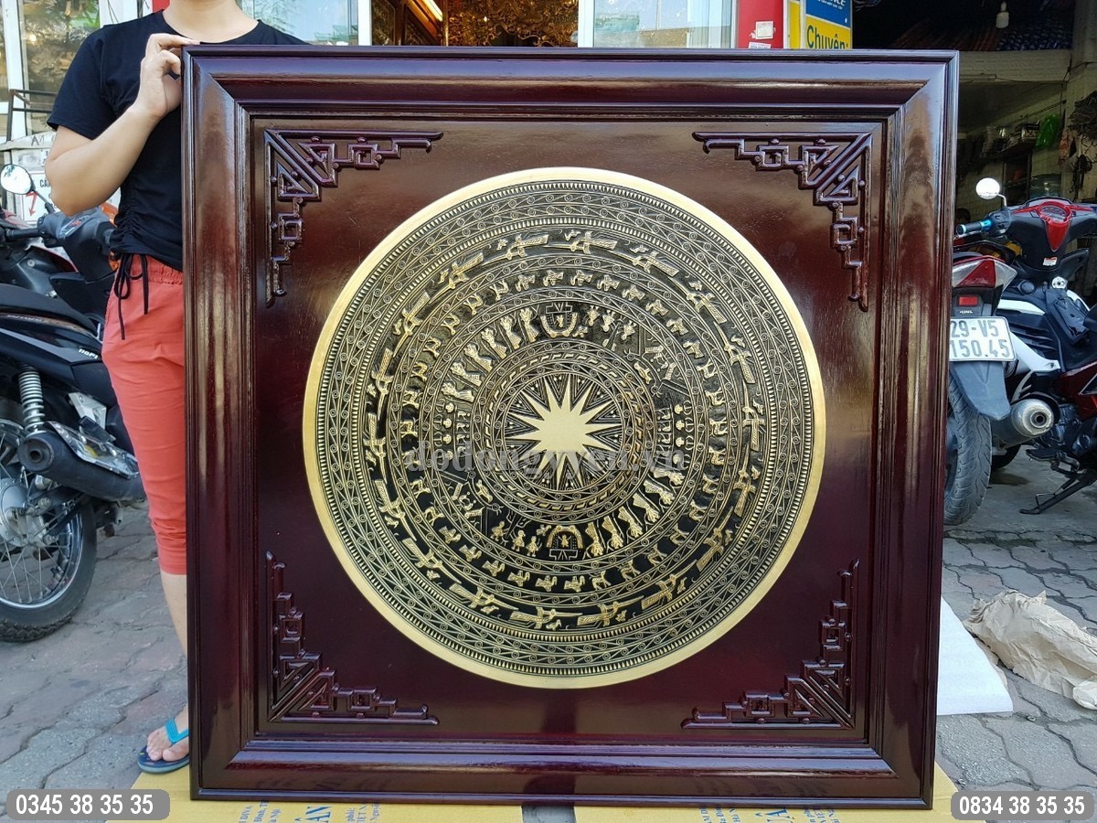 tranh mặt trống đúc